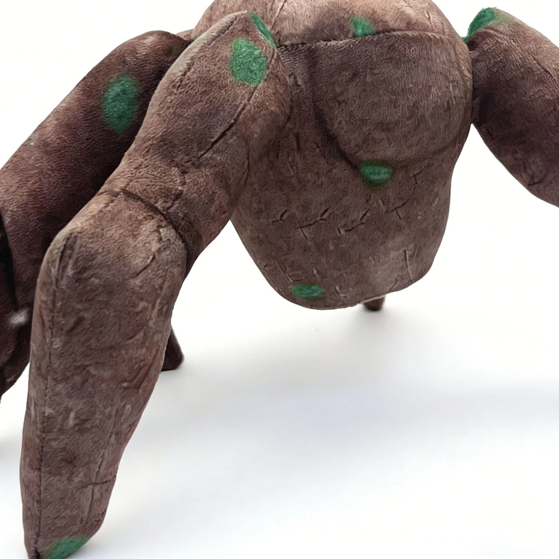 The ZoDoll Rocky Plush Project Hail Mary 20.2cm Alien Companion Stuffed Toy features a brown and green rock-like creature with two large arms and no visible face, inspired by Project Hail Mary.