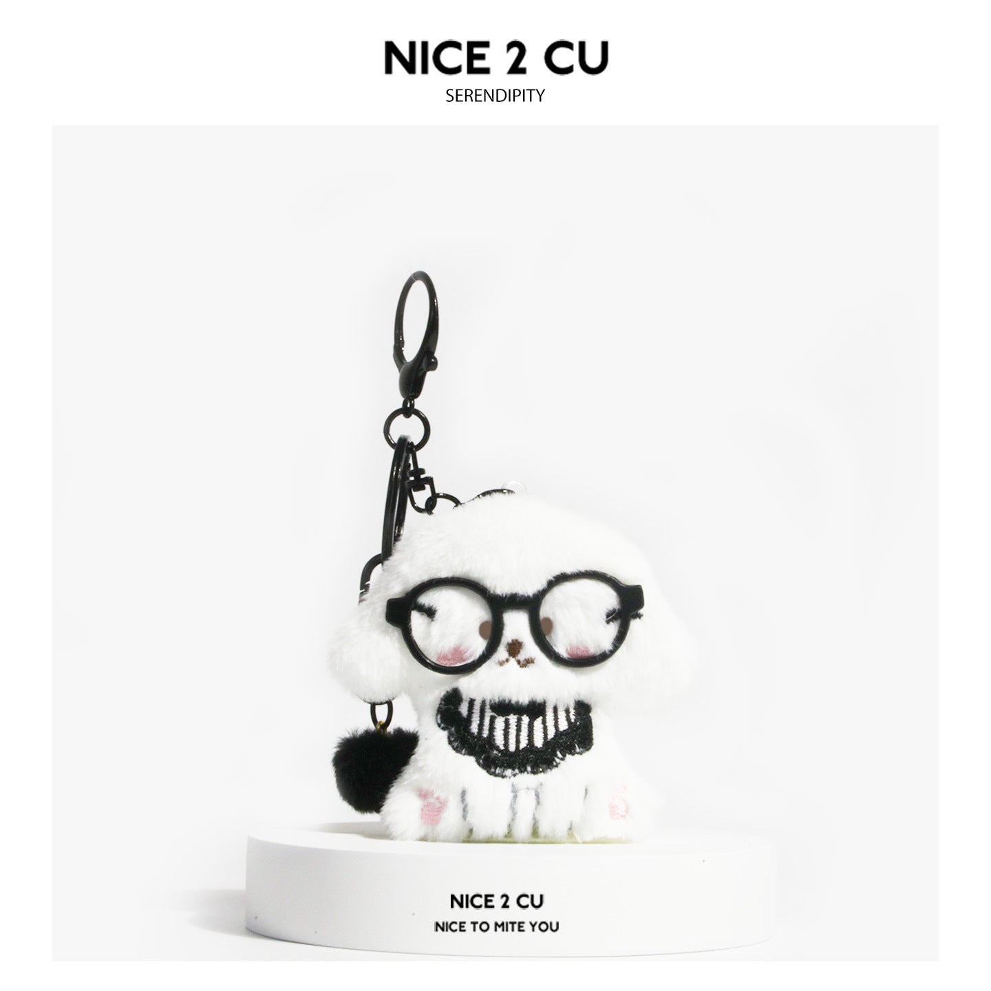 White plush dog keychain charm wearing oversized black round glasses with black hardware and striped chest decoration