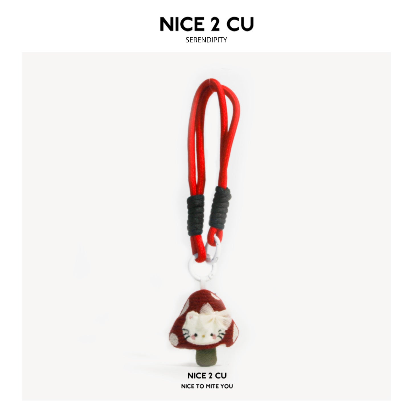 NICE 2 CU red mushroom bag charm with cat-face detail and red cord loops on white background