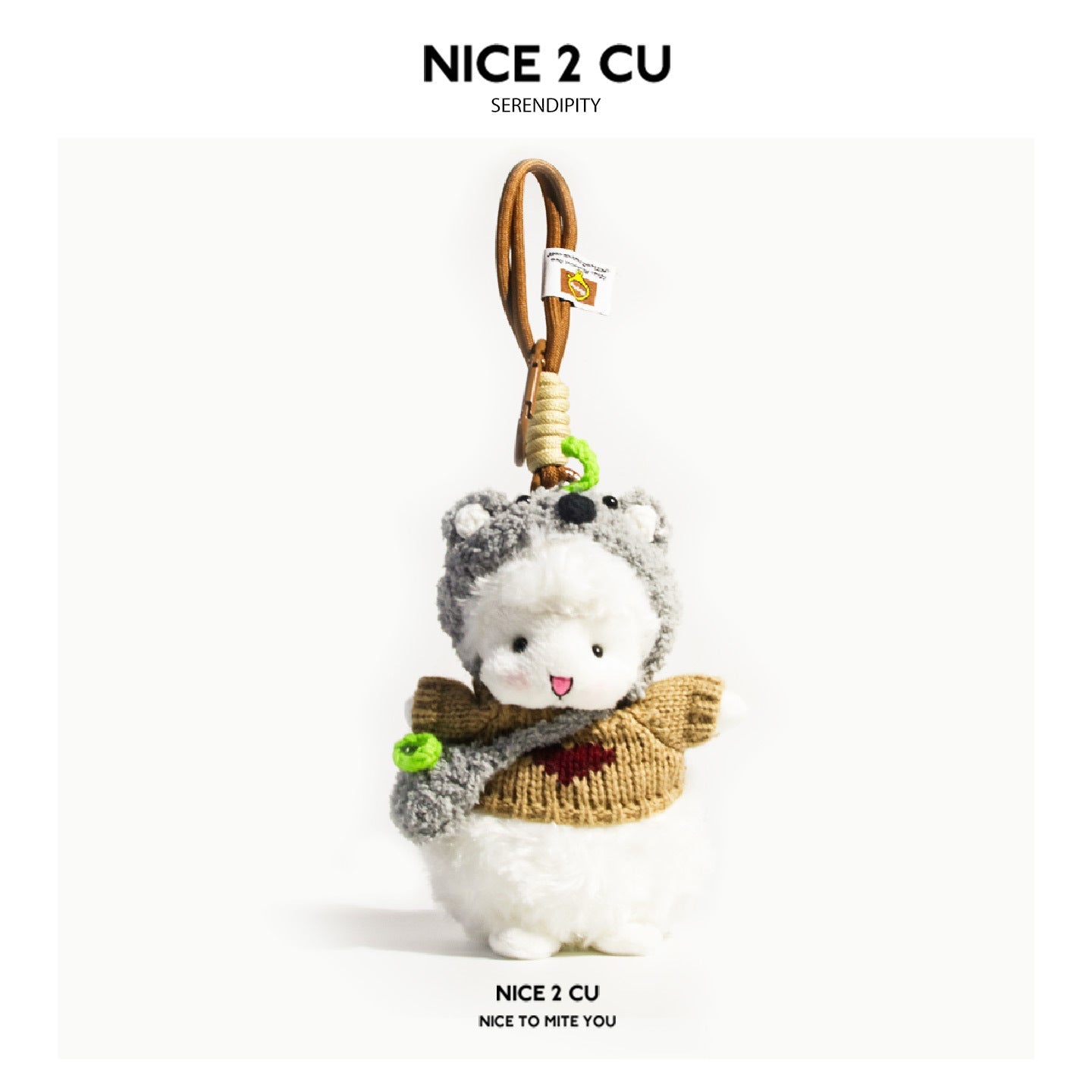 White lamb plush keychain wearing a gray koala costume hood and beige knitted sweater with green accent details