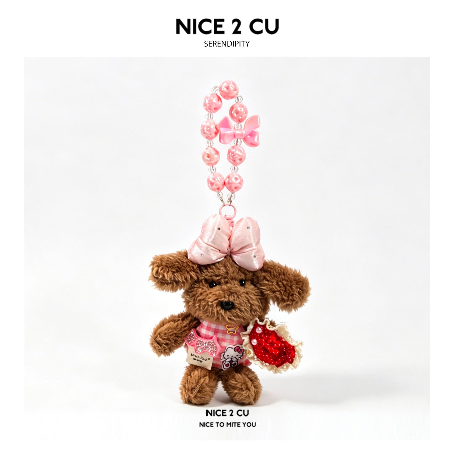 Brown plush dog charm with a pink beaded necklace strap, pink head bow, and red heart accessory — Luck style