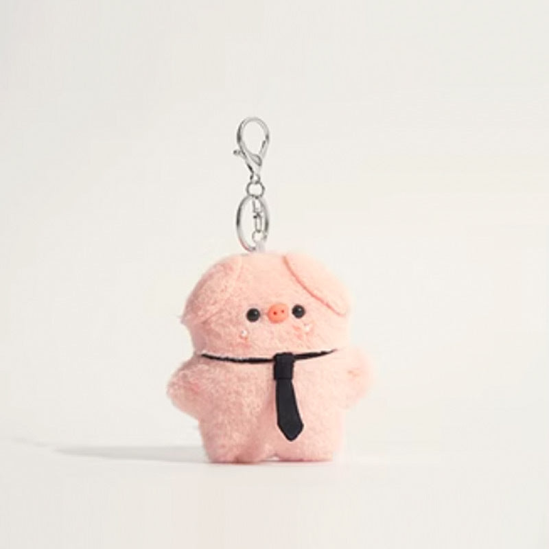Pink plush pig keychain wearing a black necktie only, silver keychain hardware above
