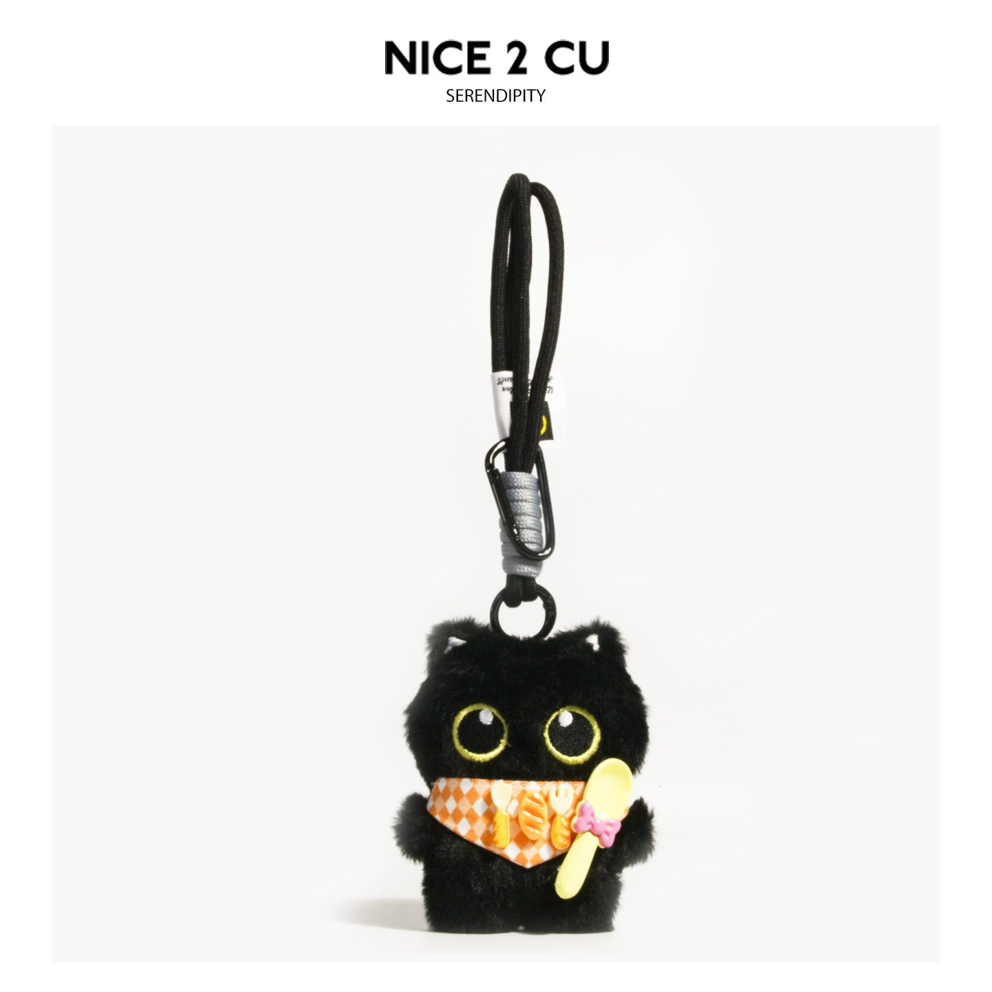 Black cat plush keychain charm with orange argyle bib and miniature yellow spoon with pink bow