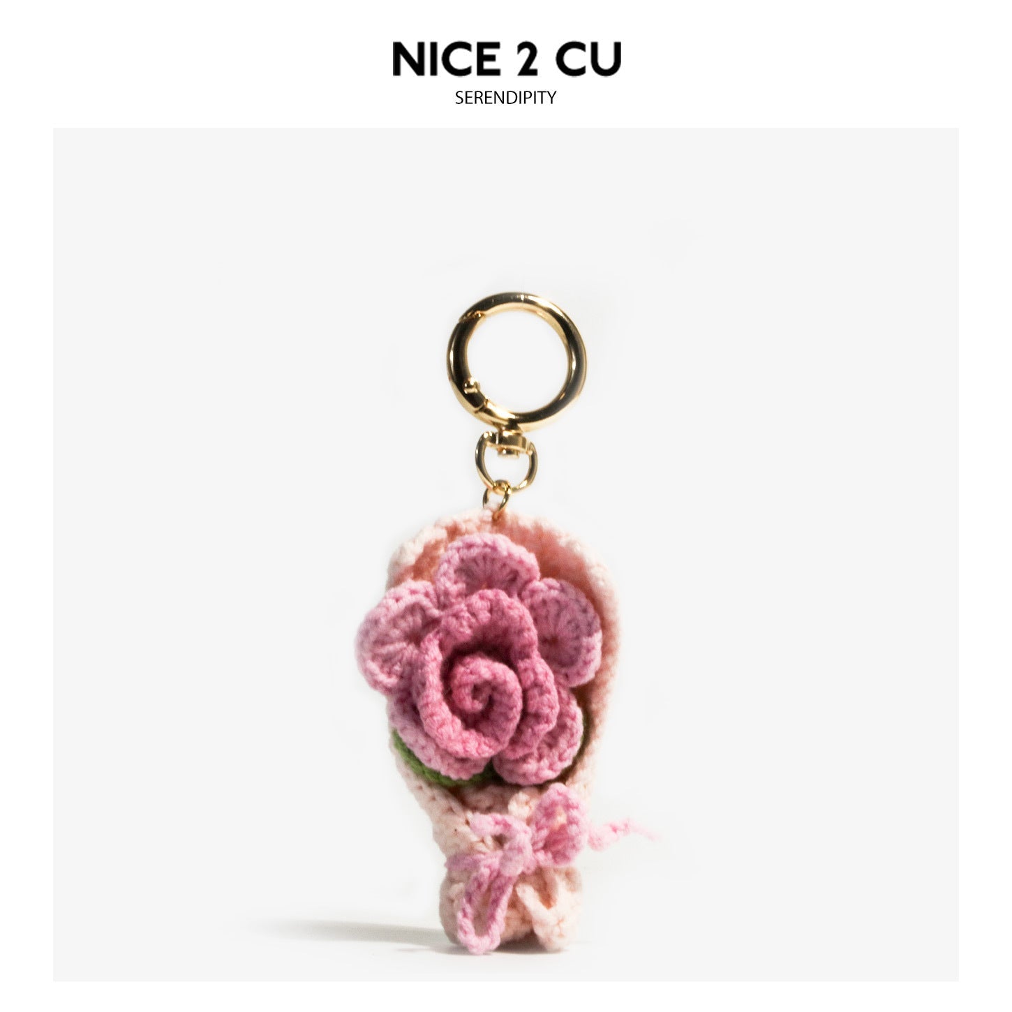 Crochet pink rose bouquet keychain pendant with pale beige wrapping and gold-tone ring