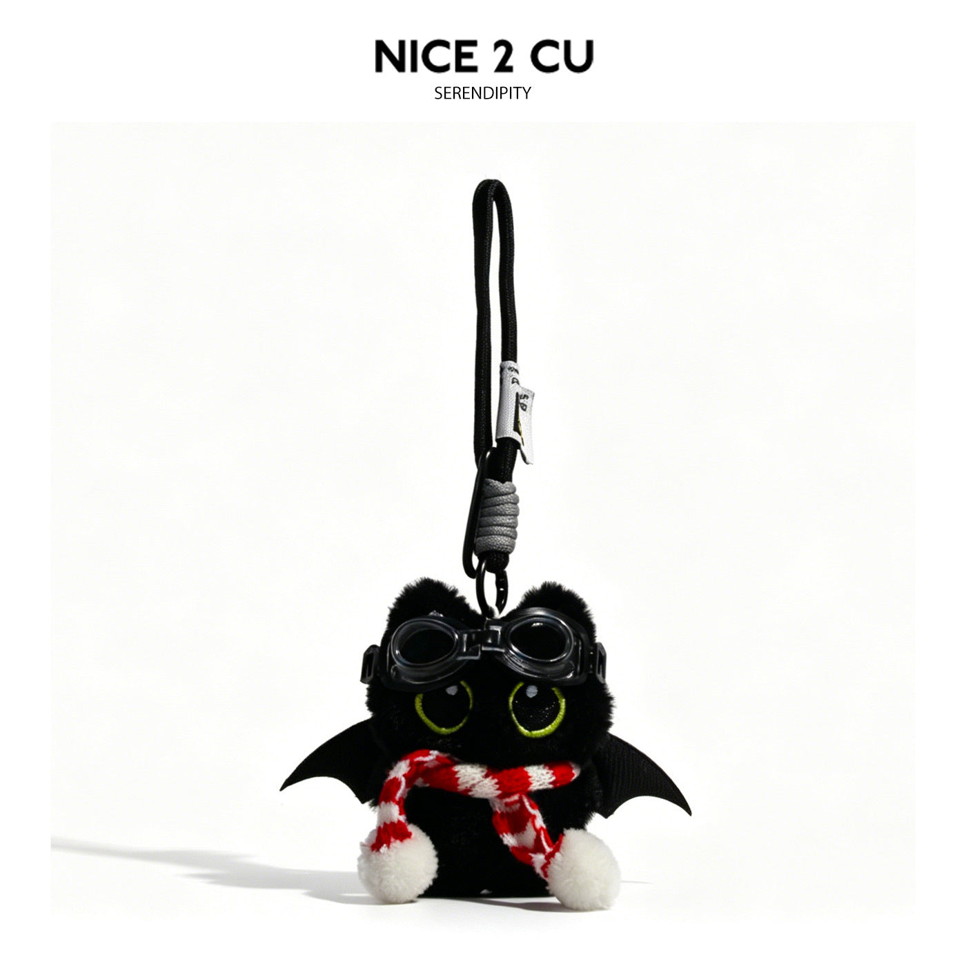 Black cat plush charm with bat wings, goggles, and red-and-white striped scarf on black braided cord