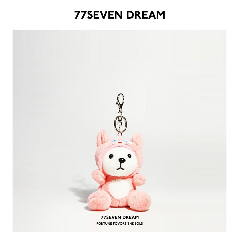 Pink plush bear keychain charm in a soft pink hooded outfit with white face and metal clip