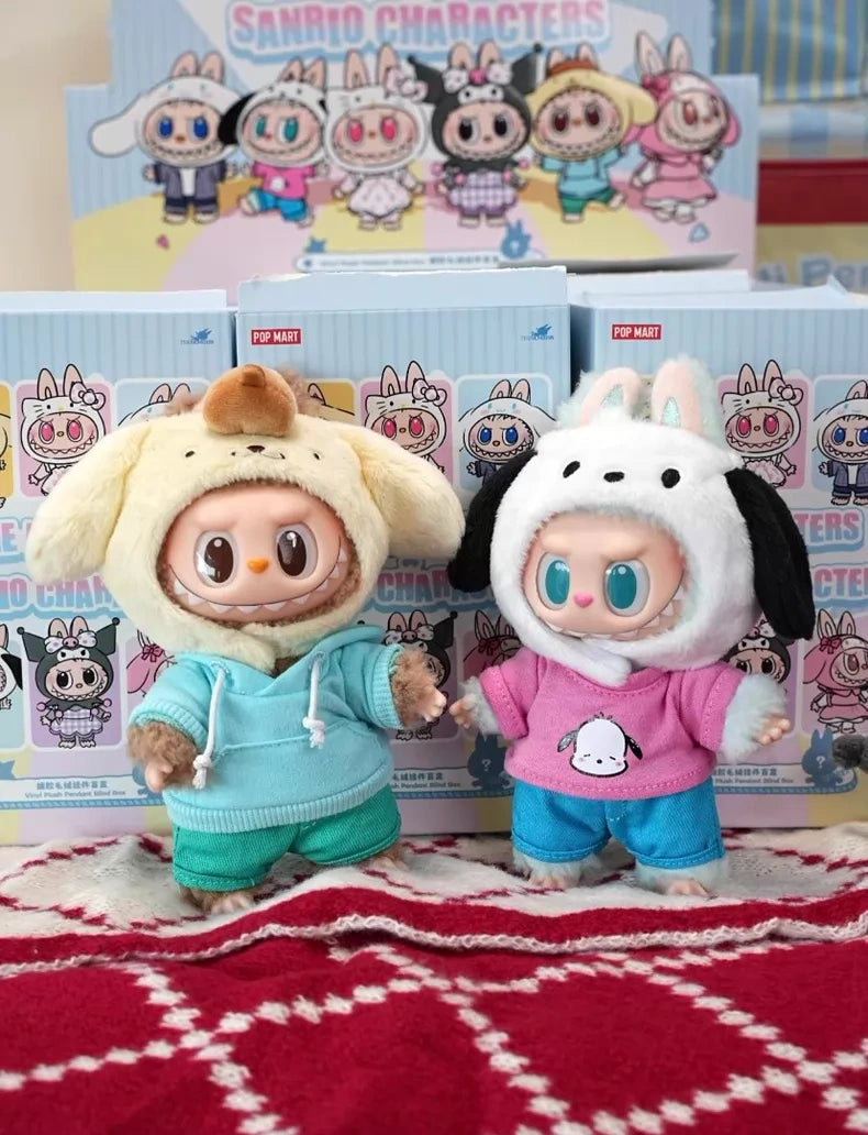 Two POP MART LABUBU Hello Kitty and Friends Series Pochacco Plush Pendant Figures stand on a red blanket, with Sanrio Characters boxes behind them—a must-have collectible for fans of kawaii accessories.
