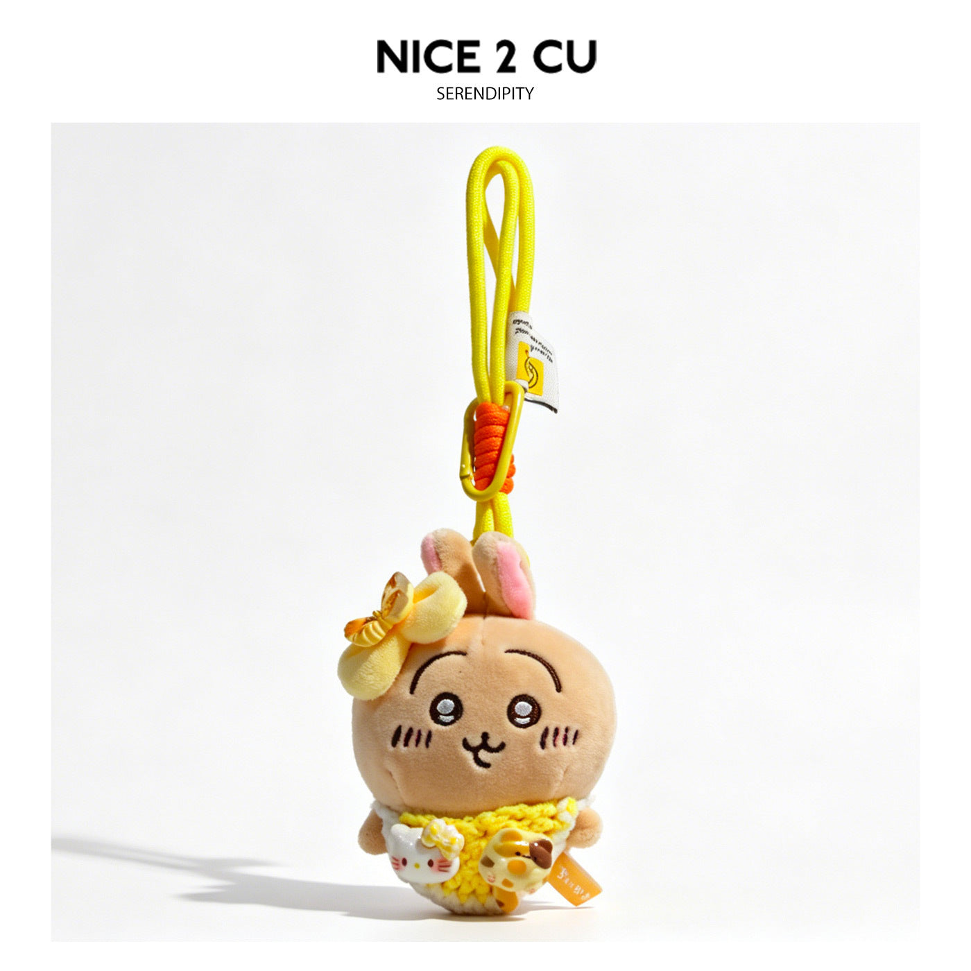 Kawaii cat plush pendant charm with yellow butterfly head accent, yellow outfit details, and bright yellow loop strap