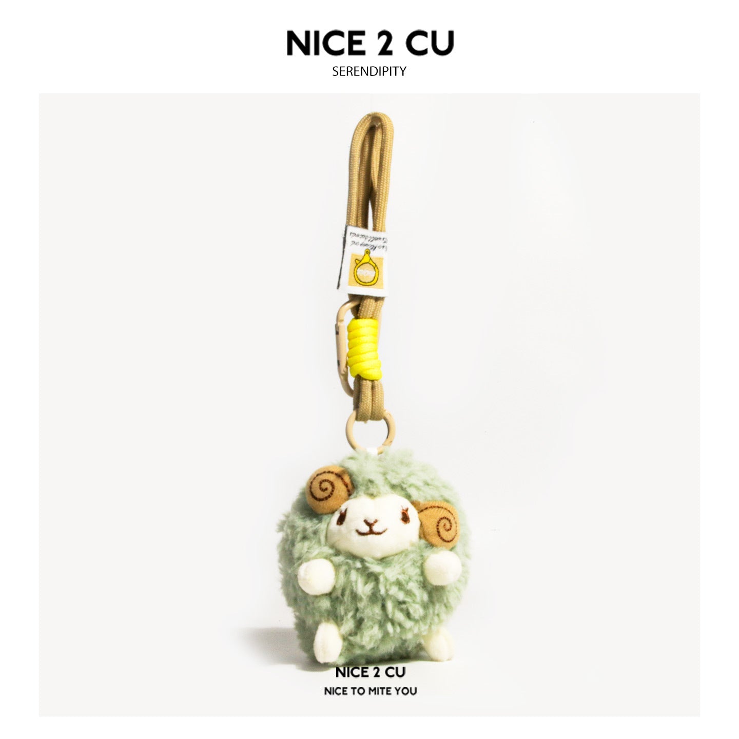 Matcha green chubby sheep plush charm with white face, beige spiral ears, and hanging loop ring