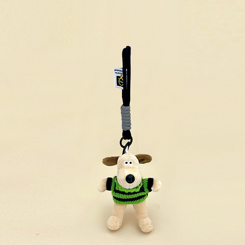Short-fur cream dog plush charm wearing black and green striped knitted sweater