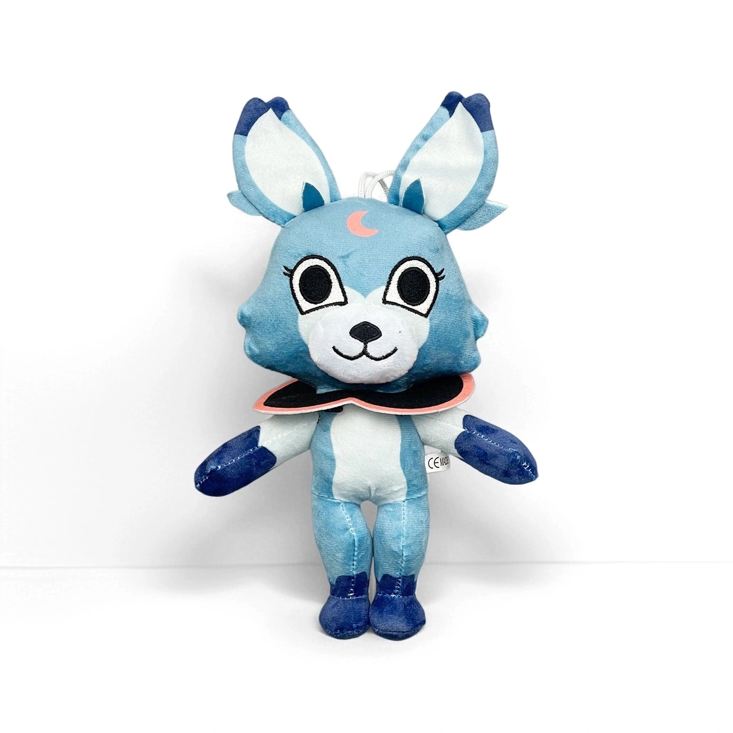 From Dandy's World Plush Collection, this individually sold soft toy features a blue and white animal with large ears, a crescent moon on its forehead, and a black and pink collar, shown standing upright against a white background.