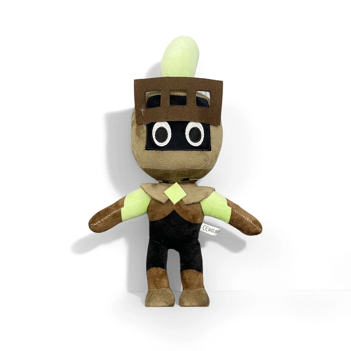 A Dandy's World Plush Collection character, featuring a brown helmet, black body, green arms, and a light green crest, stands upright against a white background. Each soft stuffed toy is sold individually by Dandy's World.