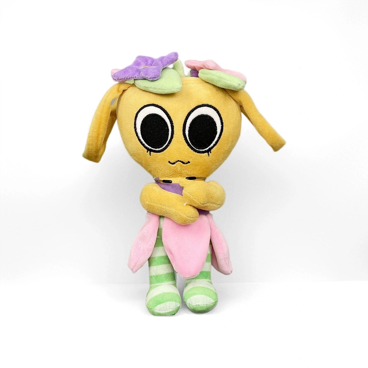 From the Dandy's World Plush Collection, this plush features a yellow character with large black eyes, green striped legs, and flower-inspired details—a delightful Dandy's World collectible sold individually.