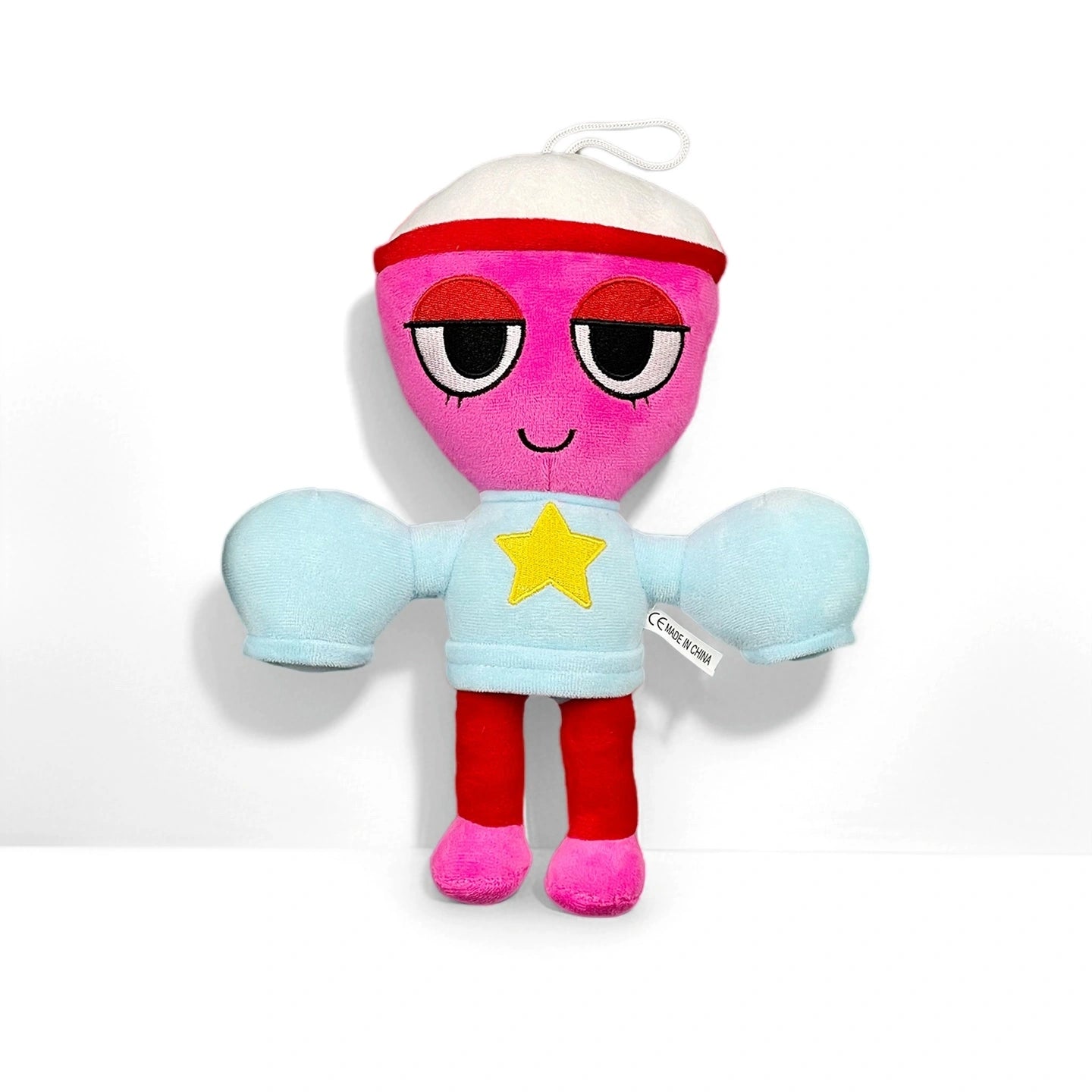 From the Dandy's World Plush Collection by Dandy's World, this soft stuffed toy features a pink face, red legs, large light blue arms, a white hat, and a star on its shirt—sold individually against a white background.