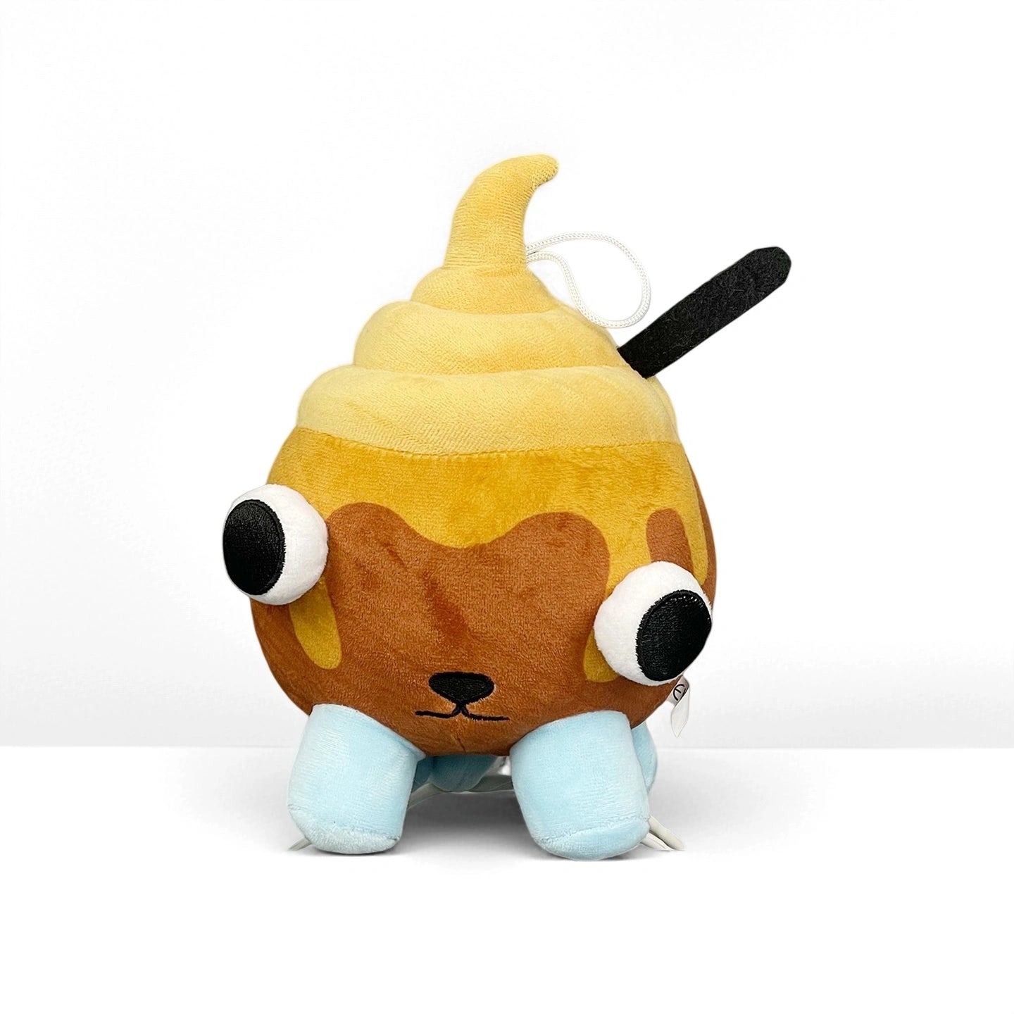 Cute Dandy's World Plush shaped like a cinnamon roll with big eyes, blue legs, swirl on top, and black detail. Part of the Dandy's World Plush Collection – Multiple Characters Available; soft toys sold individually.