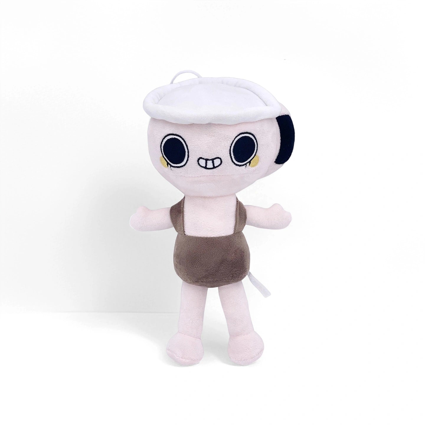 This Dandy's World Plush Collection toy features wide eyes, a big smile, light pink limbs, a brown body, and a white cap. Each soft stuffed character is sold individually by Dandy's World and stands upright against a plain white background.