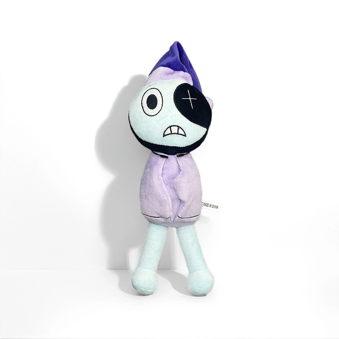 The Dandy's World Plush Collection features soft stuffed toys sold individually, like this collectible with a purple hat, light blue body, and black eyepatch—perfect for fans of Dandy's World.