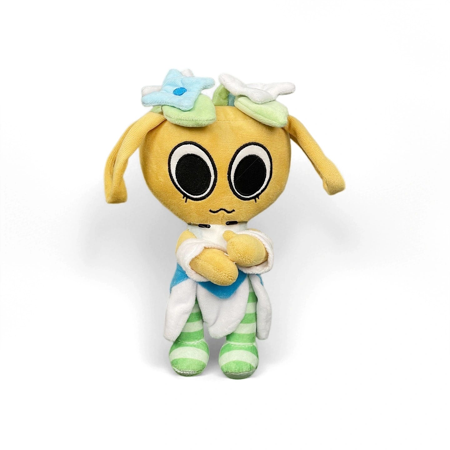From the Dandy's World Plush Collection, this soft collectible features large black eyes, flower hair accessories, green striped legs, and a white outfit with blue bib—perfect for any Dandy's World fan. Sold individually.
