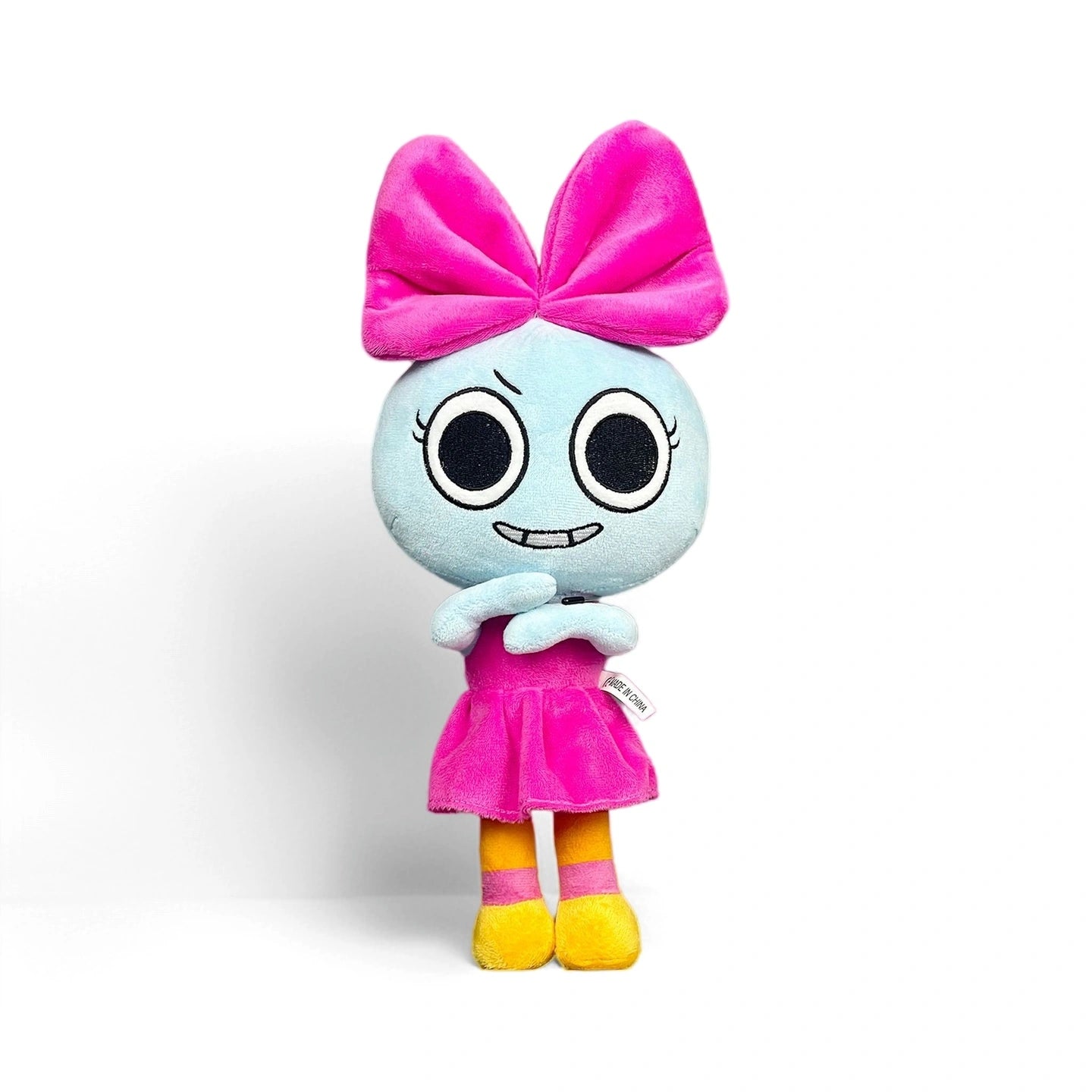 Dandy's World Plush Collection—collectible soft dolls with unique features like a blue face, big round eyes, a pink dress, and yellow shoes. Sold individually. Perfect for fans of Dandy's World!.