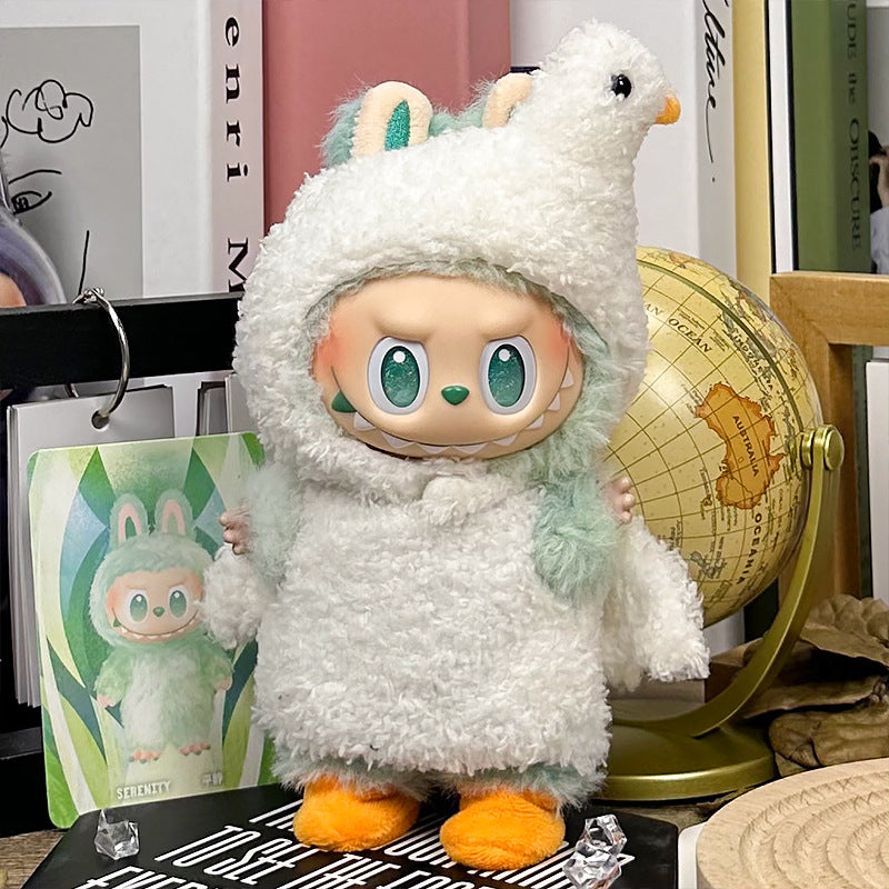 The ZoDoll Labubu White Fluffy Bird Kigurumi Doll Costume Set features a doll with big green eyes in a plush bird outfit with bunny ears and bird head, plus a small globe and matching illustrated card.