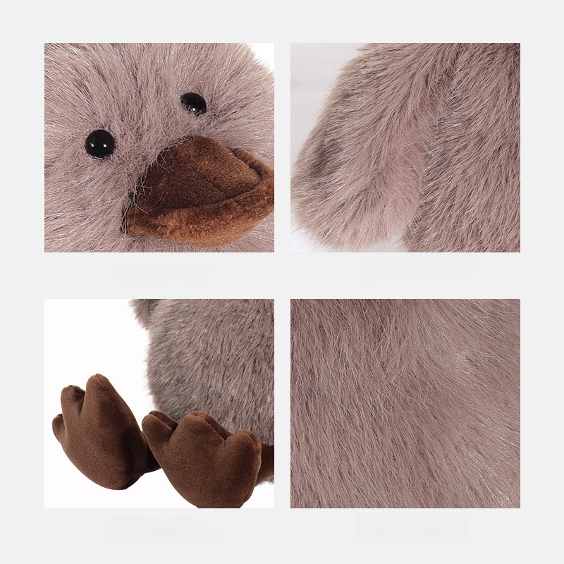 Four close-up images display the JOOKI 20cm Fluffy Duck Plush Toy, a soft brown and grey stuffed animal with a beak, paws, and webbed feet—ideal for kids and decor.