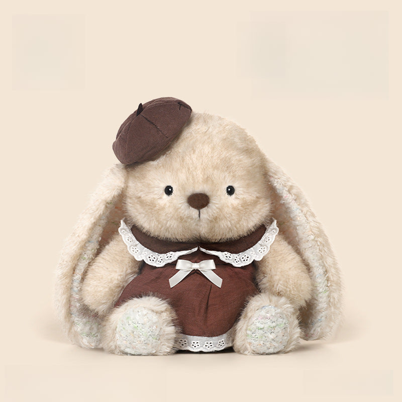The JOOKI 35cm Cute Bunny Plush Toy, featuring long floppy ears and a soft brown dress with a lace collar and matching beret, sits against a plain beige background. Perfect soft stuffed rabbit doll for girls.