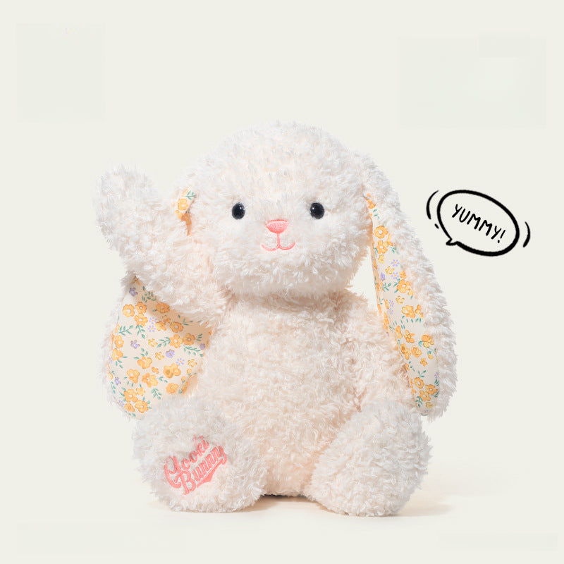 The 38cm White Bunny Plush Toy by JOOKI is a soft stuffed rabbit with floral-patterned inner ears, an embroidered paw, and a speech bubble saying "Yummy!"—a charming Easter gift for all ages.