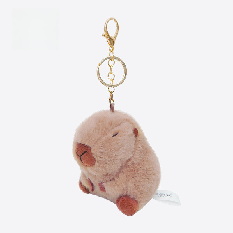 The ZEIO Guinea Pig Plush Keychain 11cm is a cute, round brown mini cavy stuffed animal with a gold keyring and clasp, perfect as a soft accessory charm.