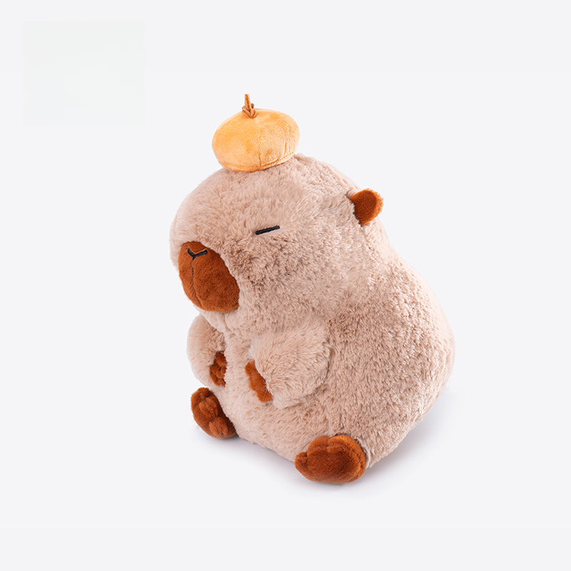 The ZEIO Capybara Plush Toy 25cm is a soft, cuddly stuffed animal featuring closed eyes, an upright pose, and a cute yellow beret—perfect for hugging or displaying.