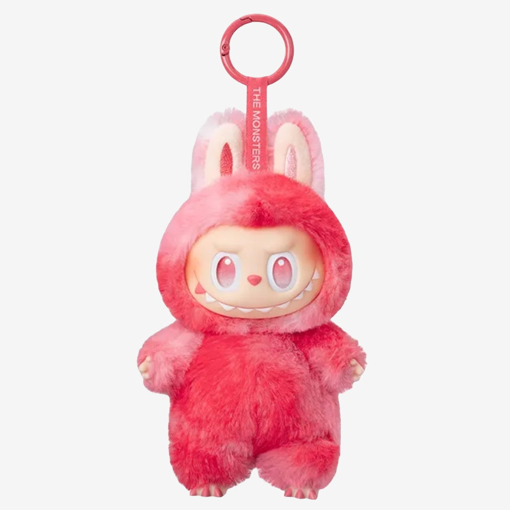 A collectible POP MART Labubu “Big Into Energy” plush keychain, featuring a grinning character in a pink and red bunny suit. Part of the 6-piece set: Love, Happiness, Loyalty, Serenity, Hope & Luck.