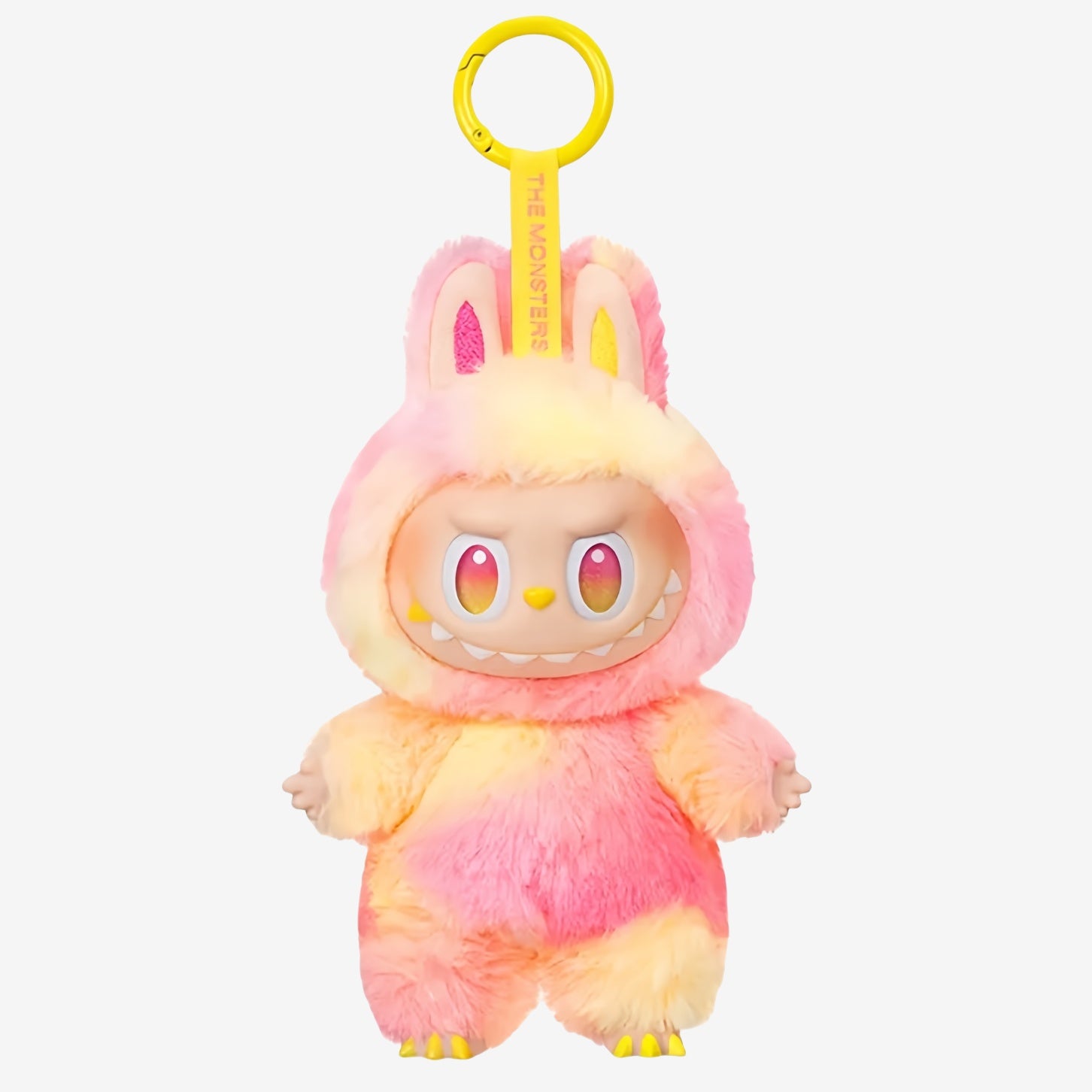 The POP MART Labubu "Loyalty" Plush Keychain from The Monsters “Big Into Energy” Tie-Dye Bunny Bag Charm series features large eyes, sharp teeth, and a yellow keyring—an essential collectible for fans.