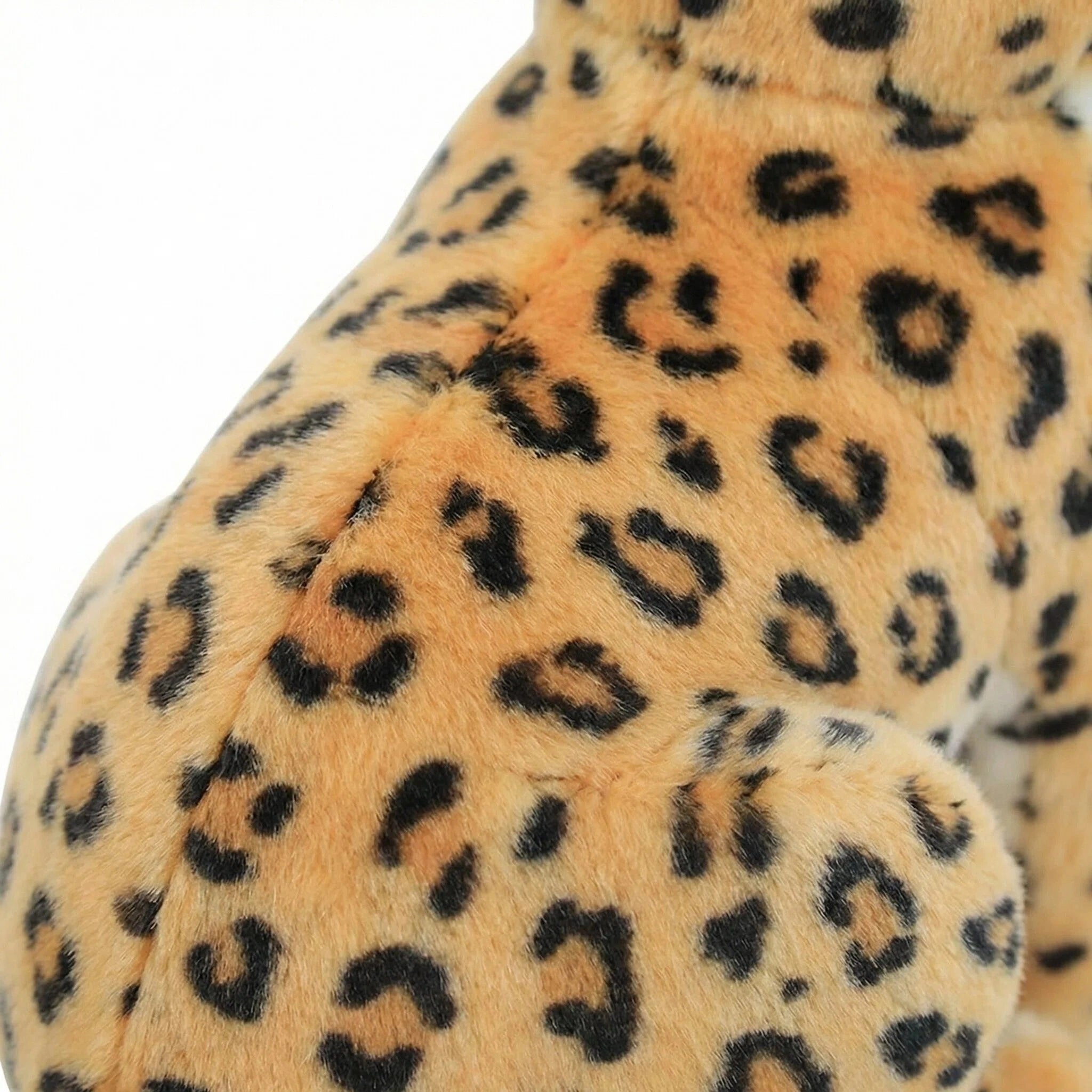 Close-up of the ZoDoll Cheetah Plush Animal Stuffed Toy, a soft and realistic plush cheetah doll with black rosette spots, available in 23cm, 27cm, and 33cm sizes against a tan background.