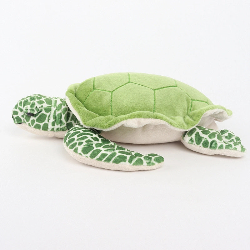 The ZoDoll Sea Turtle Plush Toy is a soft, stuffed animal pillow (25x30cm) with a light green shell and patterned green flippers—ideal for any ocean animal plush collection.