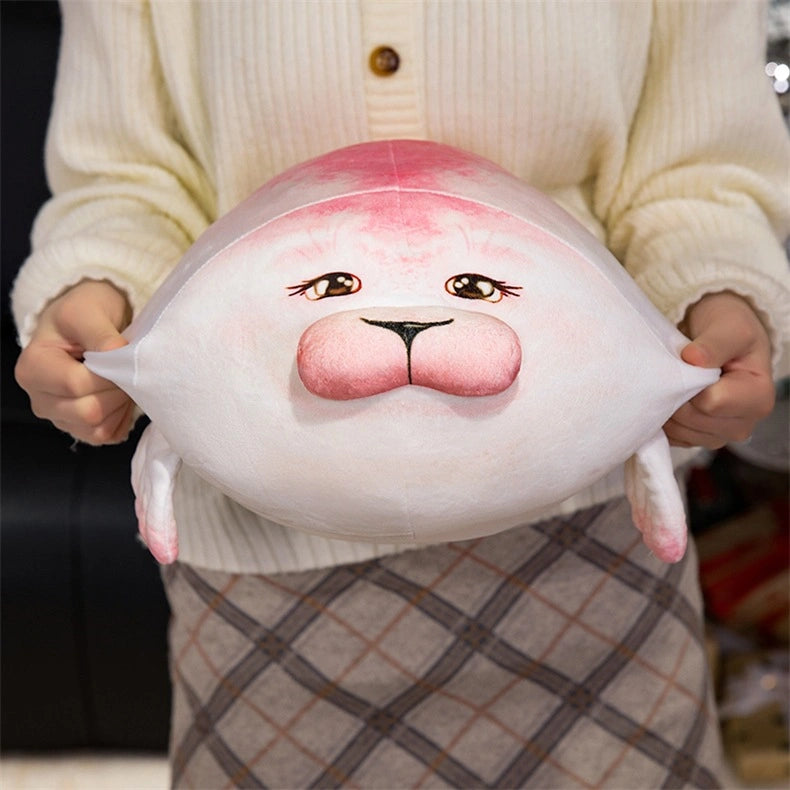 A person holds a ZoDoll Seal Plush Toys Cute Chubby Seal Plush Pillow, a soft stuffed animal (20cm/40cm) featuring an adorable white and pink seal with an expressive face.