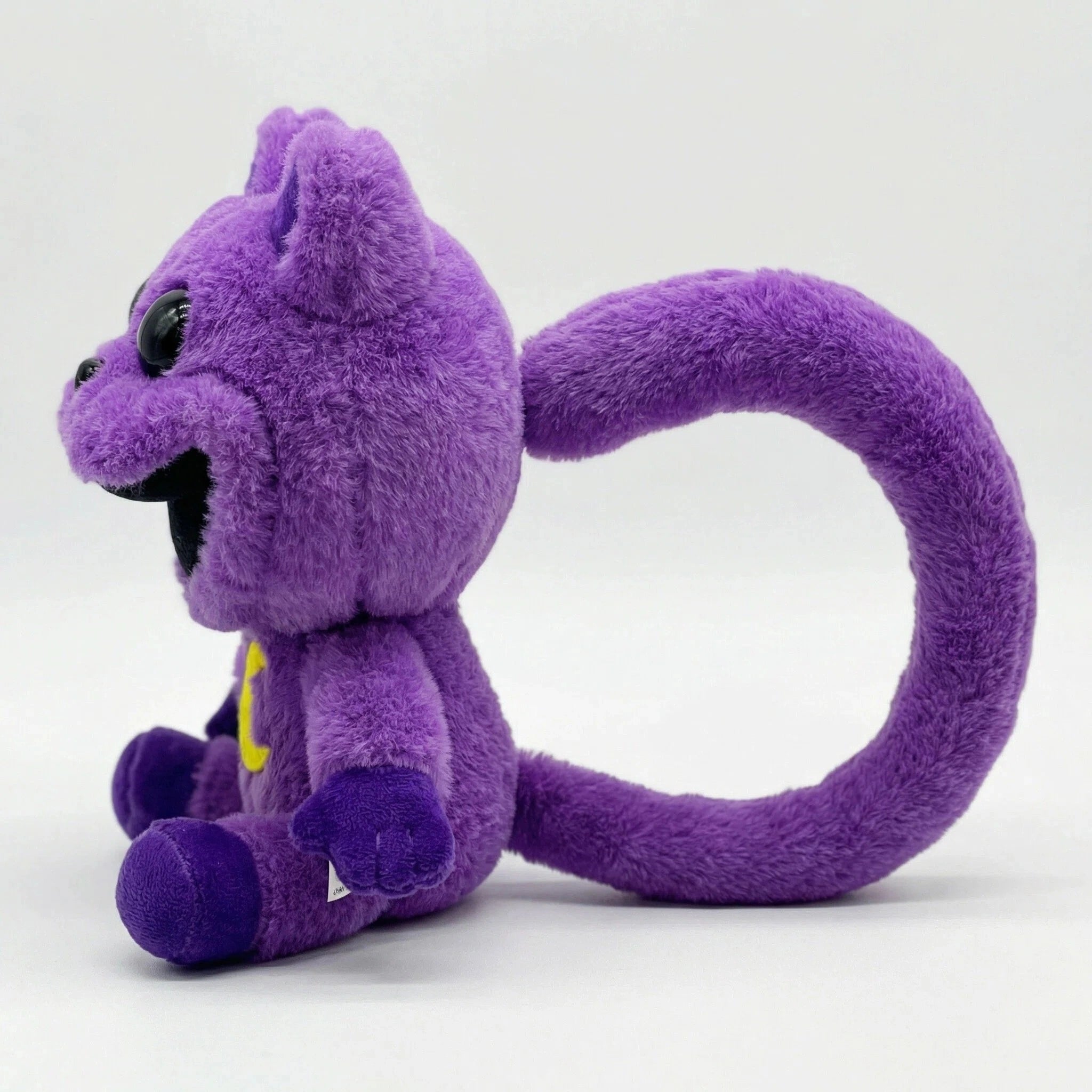 A Poppy Playtime CatNap Plush monster toy with big black eyes, open mouth, and long tail sits on a plain white background. Choose from 4 styles of Monster & Nightmare CatNap Plush Toys by Poppy Playtime.
