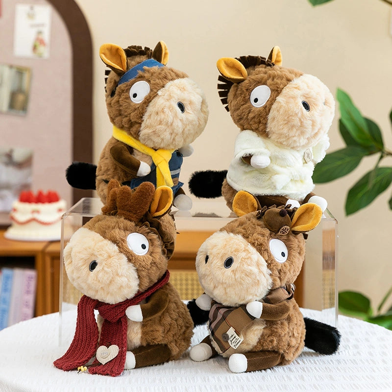 Four ZoDoll 23cm Donkey Plush Toys with round bodies and large eyes are displayed on a clear stand and white tablecloth, each featuring different removable outfits.