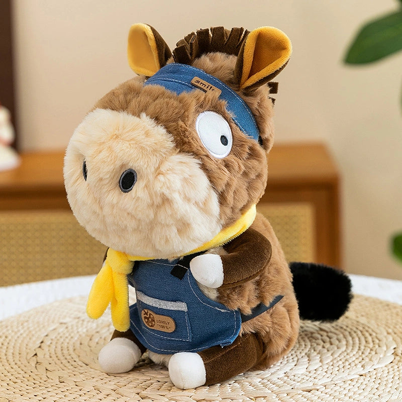 The ZoDoll Donkey Plush Toys Cute Stuffed Donkey Plush Animal, 23cm with removable clothes, features a brown and beige body in a blue denim vest, yellow scarf, and headband—an adorable indoor companion for donkey plush fans.