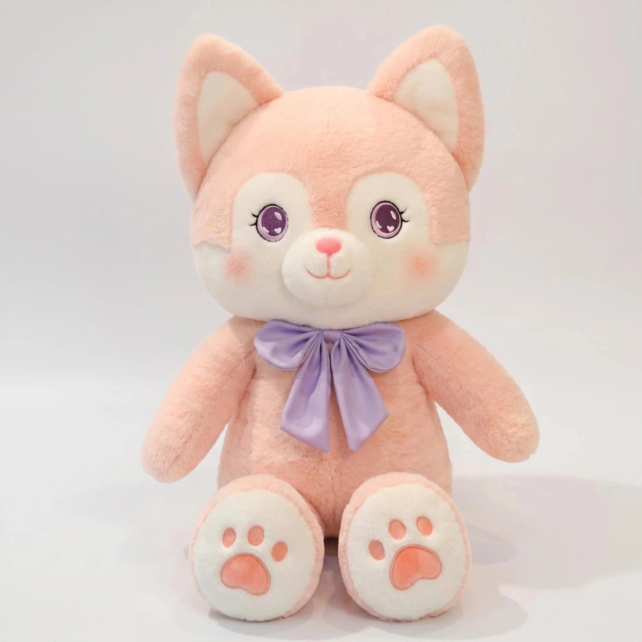 The ZoDoll Pink Fox Plush - Cute Fox Plush Doll with Bow and Kawaii Face features white accents, purple eyes, a purple neck bow, and paw prints on its feet—an adorable stuffed animal perfect for any collection.
