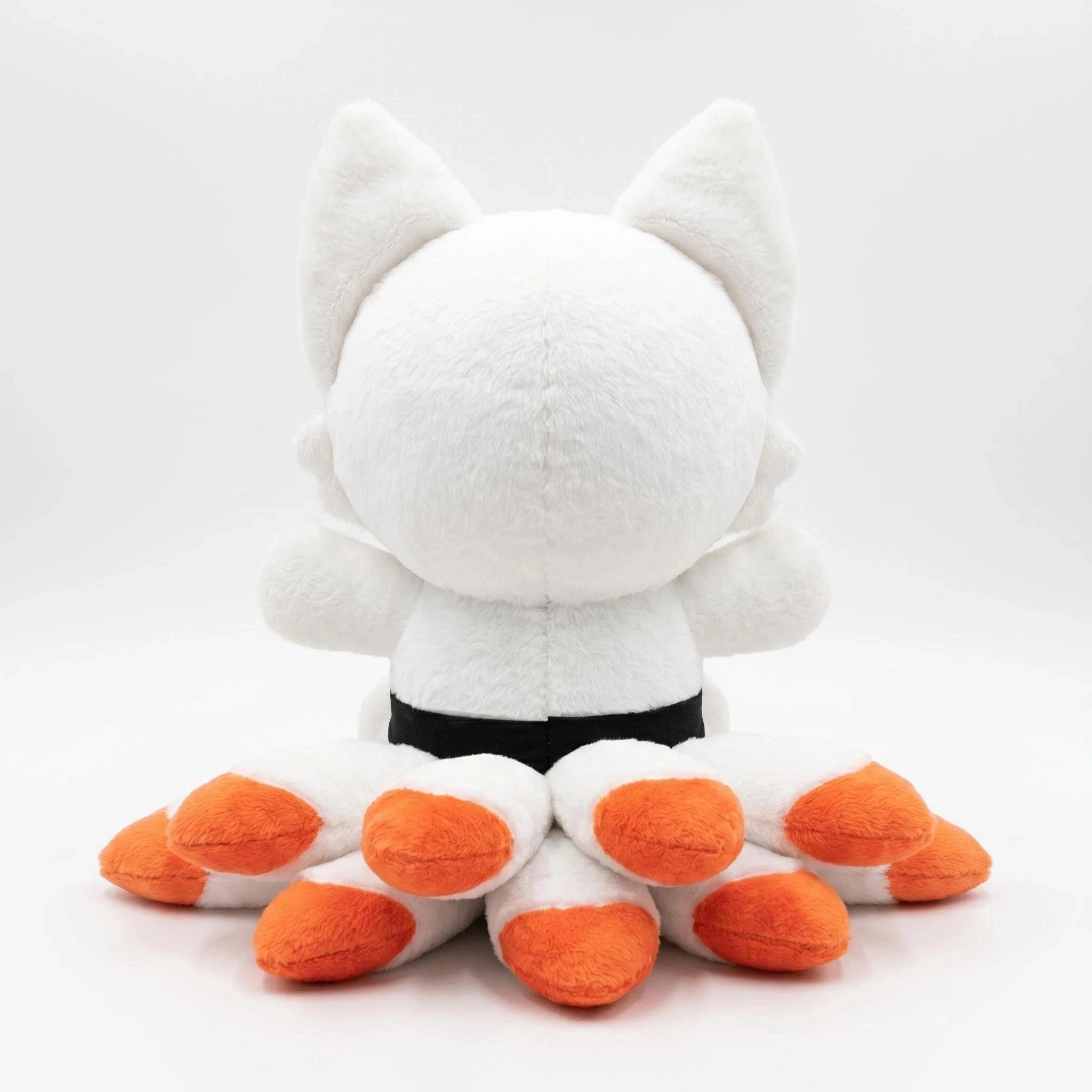 The ZoDoll White Fox Plush Toy features a cute fox doll with nine orange-tipped tails, red markings, and big ears, shown from the back against a plain white background.