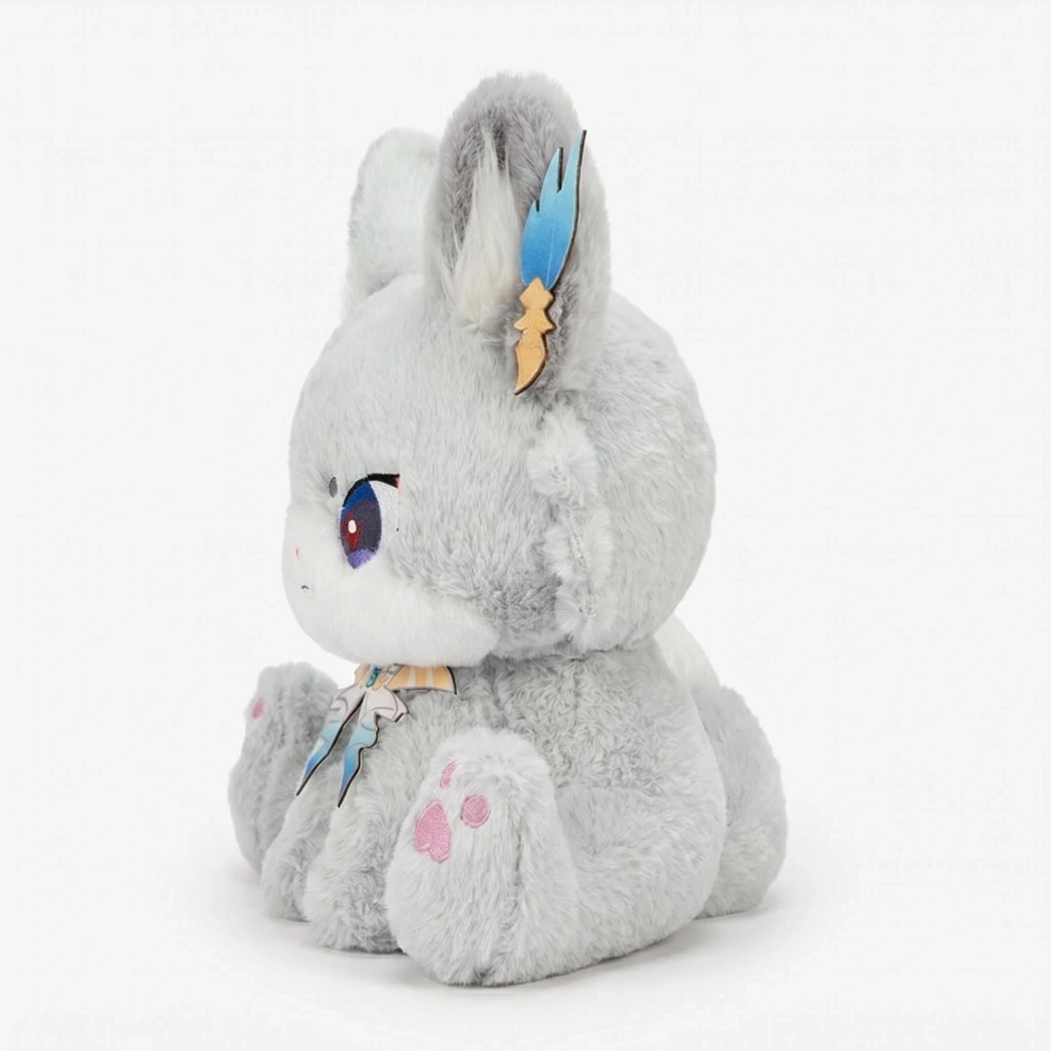 The ZoDoll Gray Fox Plush Toy is a cute silver fox stuffed animal with anime eyes, big blue and yellow accented ears, pink paw pads, and embroidered features, shown sitting upright in a side view.