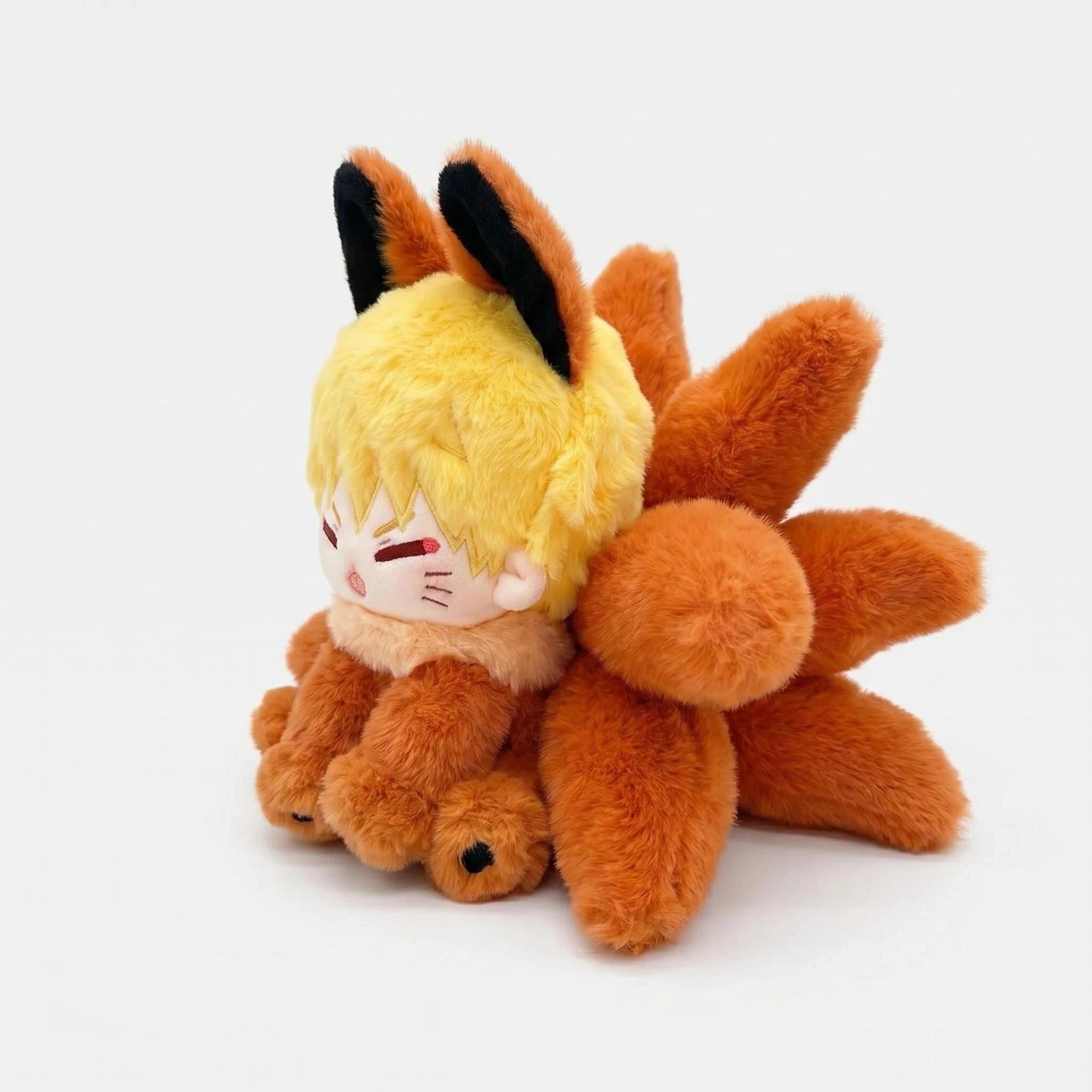 ZoDoll Nine Tailed Fox Plush – a cute anime plush toy featuring nine orange tails, fox ears, blond hair, and paw-like hands. Perfect for anime fans who love unique character designs!.