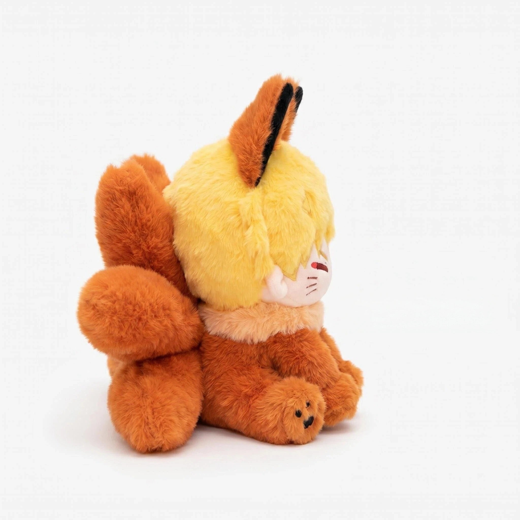 The ZoDoll Nine Tailed Fox Plush features cute anime design with blond hair and nine tails, shown in side view against a white background—ideal for fans of adorable fox plush toys.