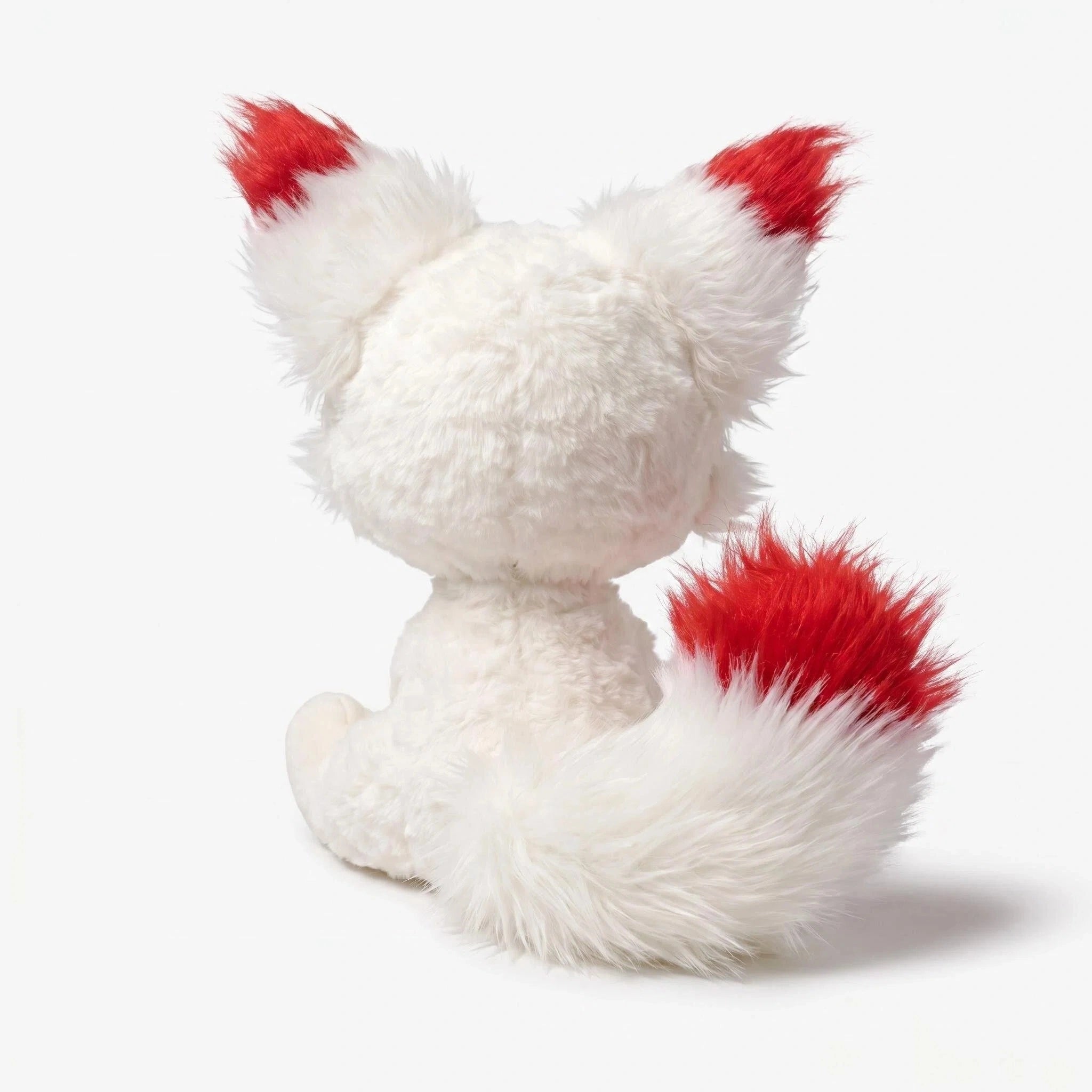 The ZoDoll White Fox Plush Toy, a cute arctic fox stuffed animal with big ears and a fluffy tail tipped with red, is shown from the back against a plain white background.