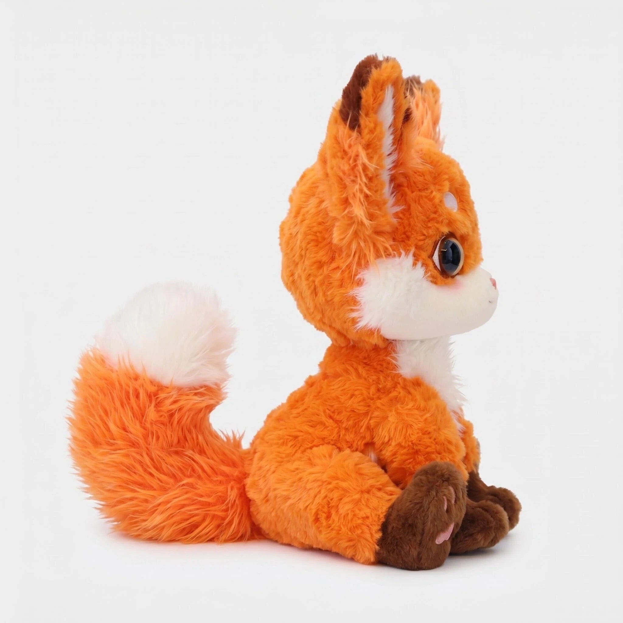 The ZoDoll Cute Fox Plush Toy, a soft red fox stuffed animal with big ears and large round eyes, sits upright in side profile on a plain white background.